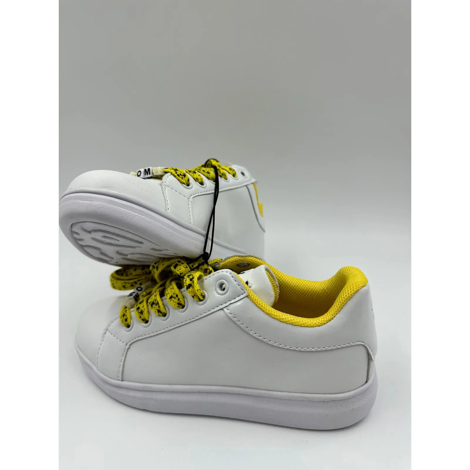 Big Kid Size 1, White Fashion Sneaker with Yellow trim and Yellow & Black Laces